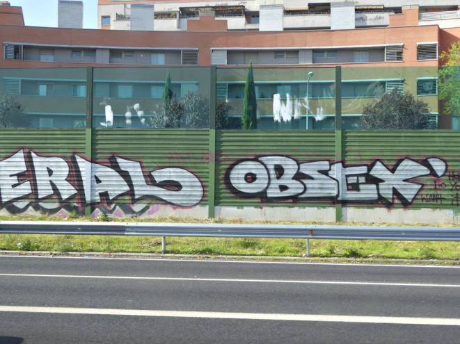 photo by @redesycalles of graffiti along the M14 highway in Madrid